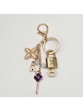 Authentic Louis Vuitton Lock & Key with unbranded Clover Flower Bagcharm 111225